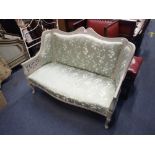 AN EDWARDIAN TWO SEATER BOUDOIR SETTEE