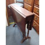 AN EDWARDIAN WALNUT SUTHERLAND TABLE