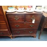 A GEORGE III STYLE MAHOGANY CHEST OF DRAWERS