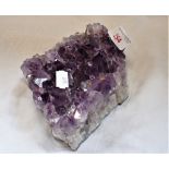 A PURPLE CRYSTAL GEODE SECTION