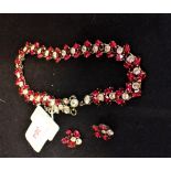 A 1960'S PASTE NECKLACE AND CLIP EARRINGS