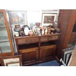 A LATE VICTORIAN WALNUT SIDE CABINET