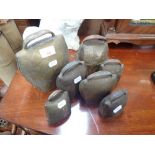 A COLLECTION OF ANTIQUE COW BELLS