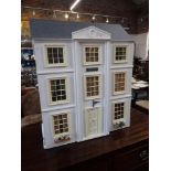 A GEORGIAN STYLE DOLL'S HOUSE