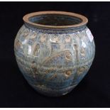 A MOTTLED BLUE GLAZED POT