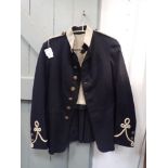 A BLACK EARLY 20TH CENTURY MILITARY JACKET