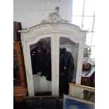 A LARGE WHITE PAINTED FRENCH ARMOIRE