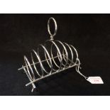 A SILVER PLATED TOAST RACK