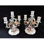 A PAIR OF DRESDEN FLORAL ENCRUSTED CANDLESTICKS