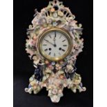 A 19TH CENTURY DRESDEN MANTEL CLOCK