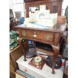 A GEORGE II OAK LOWBOY