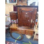 A GEORGE II OAK CORNER CABINET,