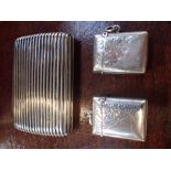 A SILVER CIGARETTE CASE