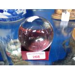 A POLISHED GLASS SPHERE