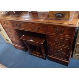 A REPRODUCTION PEDESTAL DESK