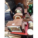 A 1930S OAK CASED MANTEL CLOCK