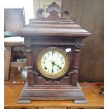 A 19TH CENTURY OAK CASED MANTEL CLOCK