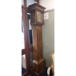 A GEORGE III THIRTY HOUR LONGCASE CLOCK