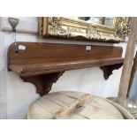 A VICTORIAN WALNUT SHELF