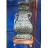 A CHINESE PATINATED BRONZE VASE