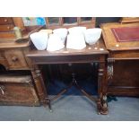 AN EDWARDIAN MAHOGANY WINDOW TABLE