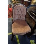 A VICTORIAN UPHOLSTERED OCCASIONAL CHAIR