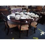 A REPRODUCTION REGENCY MAHOGANY OVAL BREAKFAST TABLE, SIX DINING CHAIRS,