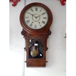 A VICTORIAN WALNUT CASED DROP DIAL WALL COCK