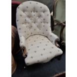 A VICTORIAN CHAIR UPHOLSTERED IN BEE PATTERNED MATERIAL