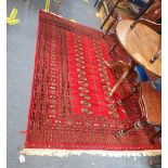 A RED GROUND RUG