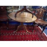 A GEORGE III OAK TRIPOD TABLE