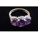 AN 'AMETHYST' AND DIAMOND DRESS RING