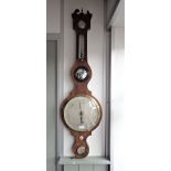 A GEORGE III MAHOGANY WHEEL BAROMETER