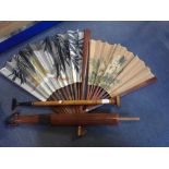 TWO LARGE ORIENTAL FANS, a similar parasol