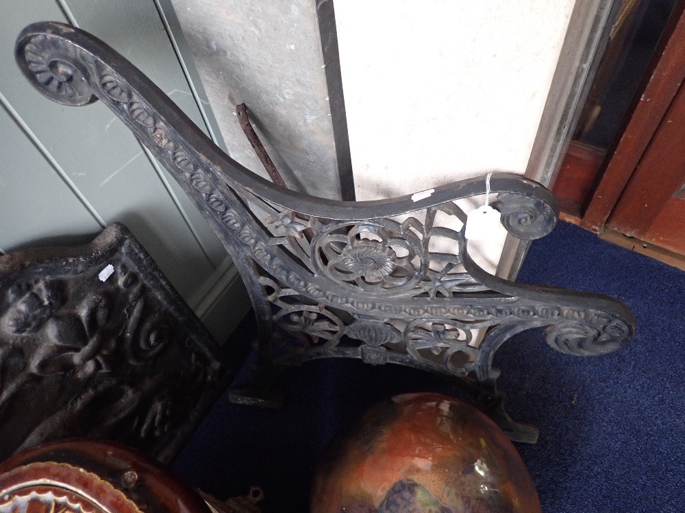 A PAIR OF VICTORIAN STYLE CAST IRON BENCH SIDES - Image 2 of 2