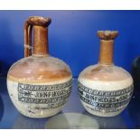 TWO 19TH CENTURY STONEWARE WHISKY JARS, 'JOHN. F. HODGES. & SONS