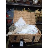 A WICKER PICNIC HAMPER