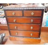 AN EDWARDIAN MINIATURE MAHOGANY CHEST OF DRAWERS