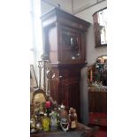 A 19TH CENTURY MAHOGANY AND OAK LONGCASE CLOCK