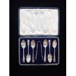 A SET OF SILVER SPOONS