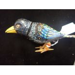 A KOHLER, WEST GERMANY CLOCKWORK TINPLATE BIRD (A CROW