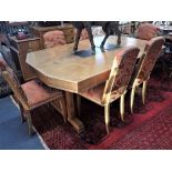 AN ART DECO OR JAZZ MODERNE WALNUT DINING SUITE