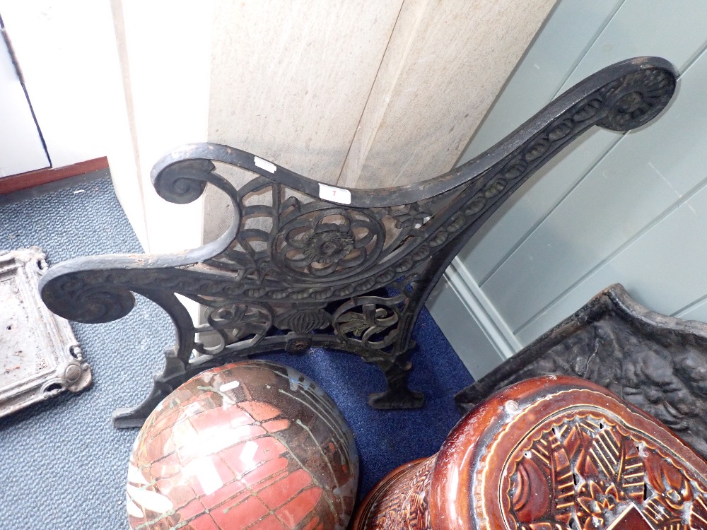 A PAIR OF VICTORIAN STYLE CAST IRON BENCH SIDES