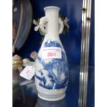 A SMALL CHINESE BLUE AND WHITE BOTTLE VASE
