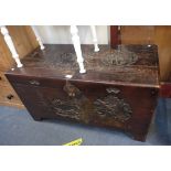 AN ORIENTAL CARVED CAMPHORWOOD CHEST