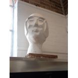 A PLASTER SCULPTURE OF A LADY'S HEAD