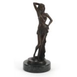 Patinated bronze study of a scantily dressed female raised on a circular marble base, 32cm high :