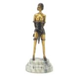 Erotic bronze figure of a dominatrix raised on a step marble base, 32cm high : For Further Condition