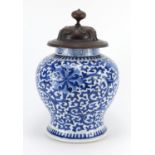 Chinese blue and white porcelain baluster vase, hand painted with flower heads amongst scrolling