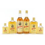 Six bottles of vintage White Horse Whisky, one with box, comprising sizes 75cl, 37.8cl and 9.4cl :